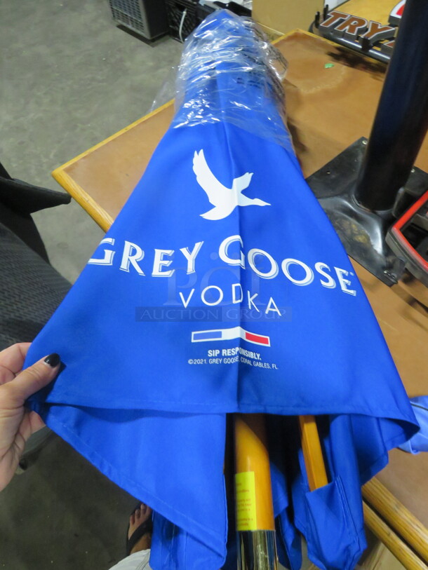 One NEW Grey Goose Patio Umbrella.  - Image 1 of 1