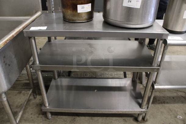 Stainless Steel Commercial Table w/ 2 Under Shelves. 36x18x35