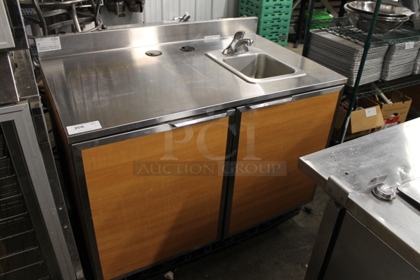 Duke SUBPS-48-R M Stainless Steel Commercial Counter w/ Bay and 2 Wood Pattern Doors. 