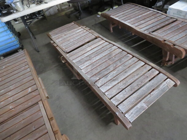 One Adjustable Wooden Chaise Lounger With 2 Wheels, And A Pullout Shelf. Needs A Lil Adjusting. 72X23 - Image 1 of 3