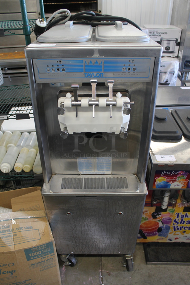 2010 Taylor 794-33 Commercial Stainless Steel Electric Water Cooled Soft Serve Ice Cream Machine With 2 Hoppers On Commercial Casters. 208-230V, 3 Phase.