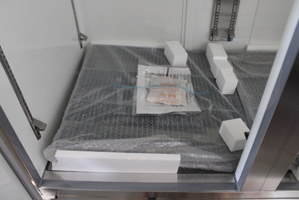 BRAND NEW SCRATCH AND DENT! Avantco 178A49RHC Stainless Steel Commercial  Two Door Reach In Cooler w/ Poly Coated Racks. 115 Volts, 1 Phase. Tested and Working! - Image 9 of 10