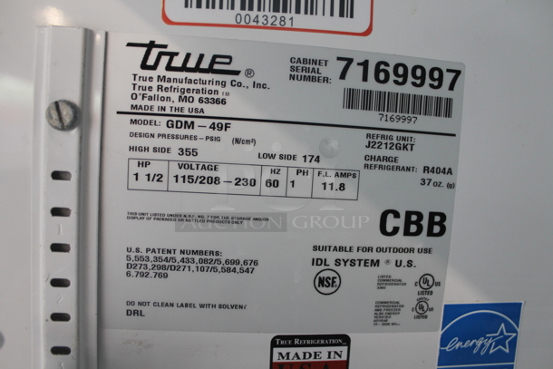 2011 True GDM-49F ENERGY STAR Metal Commercial 2 Door Reach In Freezer Merchandiser w/ Poly Coated Racks on Commercial Casters. 115/208-230 Volts, 1 Phase.  - Image 8 of 8