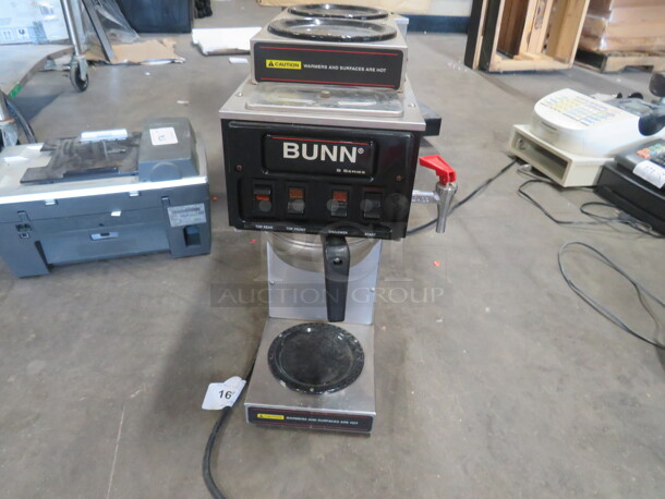 One Bunn Coffee Brewer With Filter Basket And Dual Warmers. 10X8X21