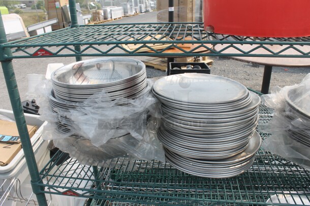 ALL ONE MONEY! Lot of Items Including Metro Shelf With Red Salad Spinner, Aluminum/Steel Plates And Bowls. BUYER MUST DISMANTLE. PCI CANNOT DISMANTLE FOR SHIPPING. PLEASE CONSIDER FREIGHT CHARGES. - Image 3 of 5