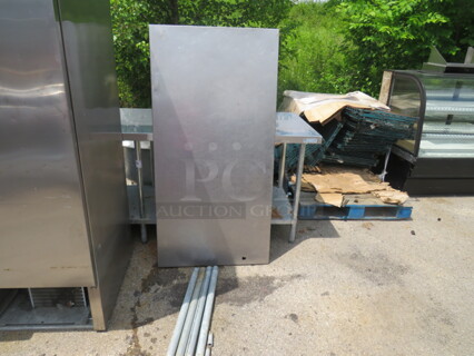 One Stainless Steel Table. Need Legs Attached. 60X30X32