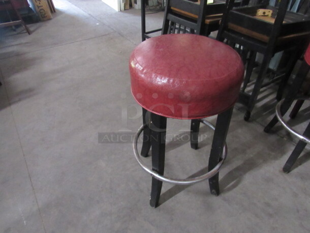 Wooden Bar Stool With Red Cushioned Seat And A Footrest. 2XBID