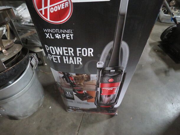 One NEW Hoover Wind Tunnel XL Pet Hair Vacuum.