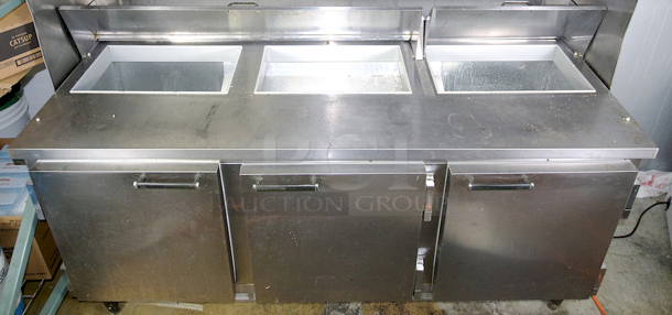 OUTSTANDING! Beverage-AIR SUR72/18 72" Sandwich/Salad Prep Table w/ Refrigerated Base, Over-Shelf With Electric Food Warmer, 3 Doors and (2) Separate Covers - Holds Up To 18 1/6 Pans. IN WORKING ORDER! 120v 72 in. W x 32 in. D x 70 in. H - Image 6 of 7