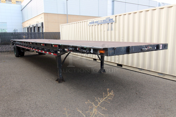 ROAD READY!! 40FT Steel Flatbed Tailer, 4 Wheels. 40FTx96".    VIN# 070F1283; Year 1970; Manufacturer Pike Trailer; Type Flatbed; Steel Construction; Length x Width 40' x 96"; Spring Ride Suspension; Location Single Fixed Axle; Tire Size LP 22.5; Wheel Construction Steel; Wheel Type Budd - Image 1 of 10