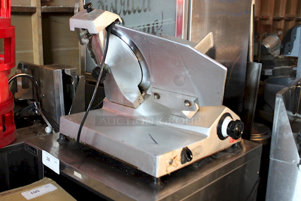 DO NOT PASS THIS BY! Univex 7512 Manual Meat & Cheese Slicer w/ 12" Blade In OUTSTANDINGLY GOOD CONDITION!! Belt Driven, Aluminum, 1/2 hp, WORKING! 120v/20hz/1phase 25"x21-1/2x20-3/4 87lbs - Image 4 of 6