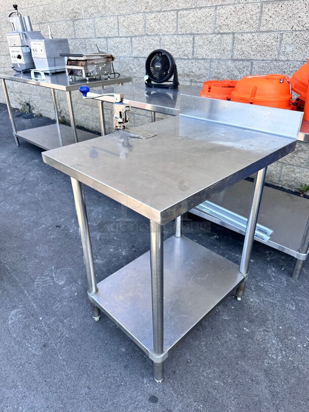 Nice 24 Inch Stainless Steel Table With Can Opener  - Image 1 of 7