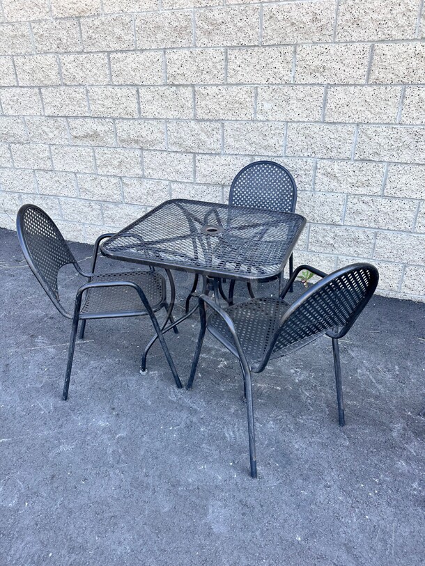 One Set Of Metal Table and Three Chairs - Item #1108589